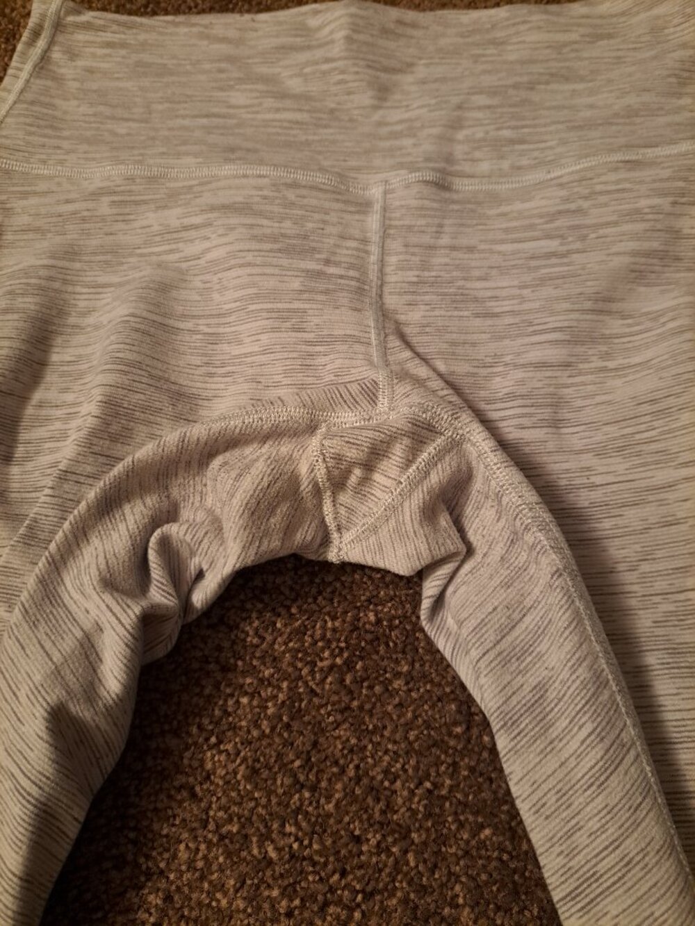 Lululemon Wunder Under high-rise leggings in a light heathered gray. - Picture 7 of 8